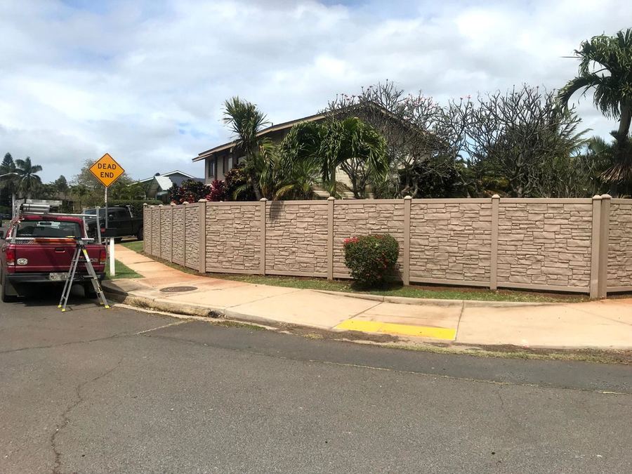 New privacy wall along a residential street